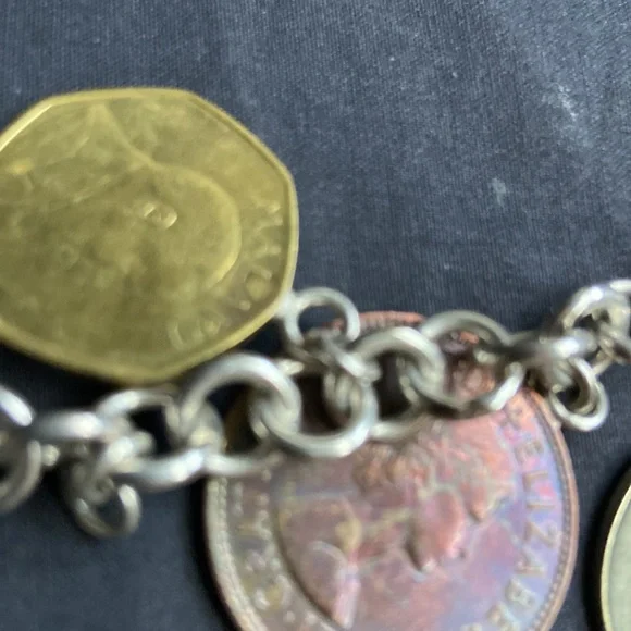 925 sterling silver coin charm bracelet 11 of them on here milor bracelet